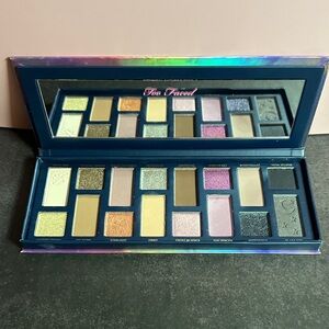 Too Faced Cosmic Crush Eyeshadow Palette with Gold, Green, and Purple Hues